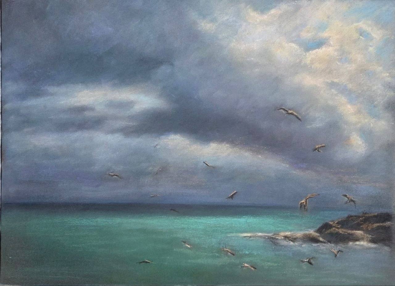 Pastel seascape with turquoise water, a rocky shore and seagulls beneath dark storm clouds.